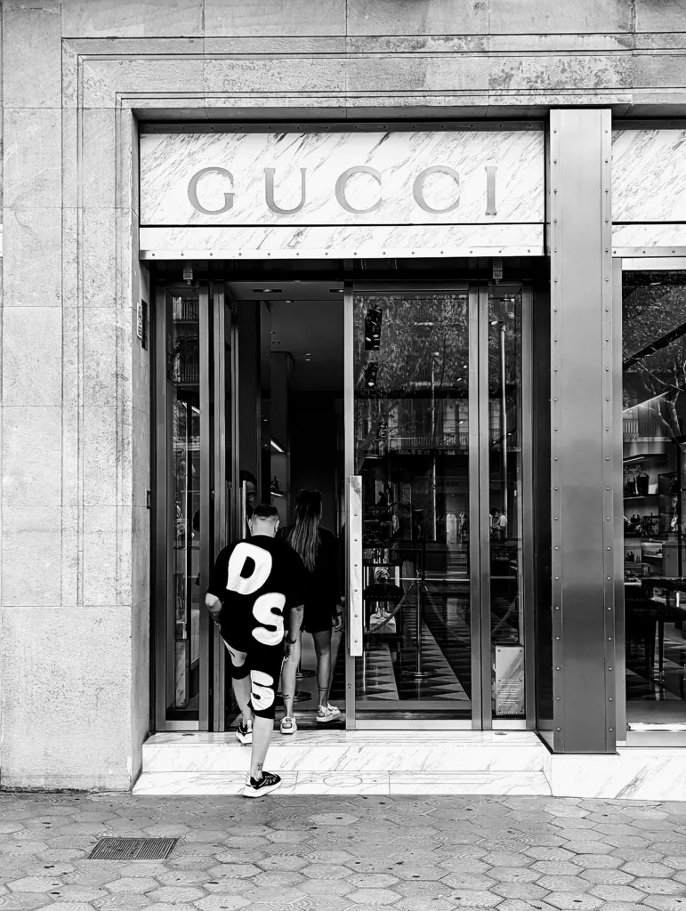 Ludicrously dressed man steps into Gucci store