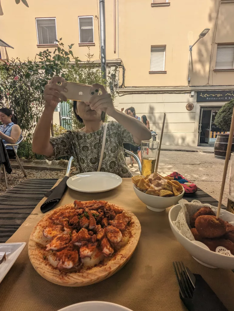 Sachie photographing tapas lunch