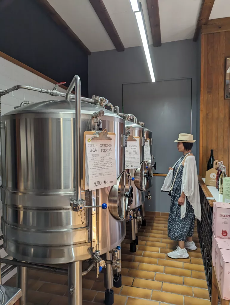 Sachie looking at wine vats