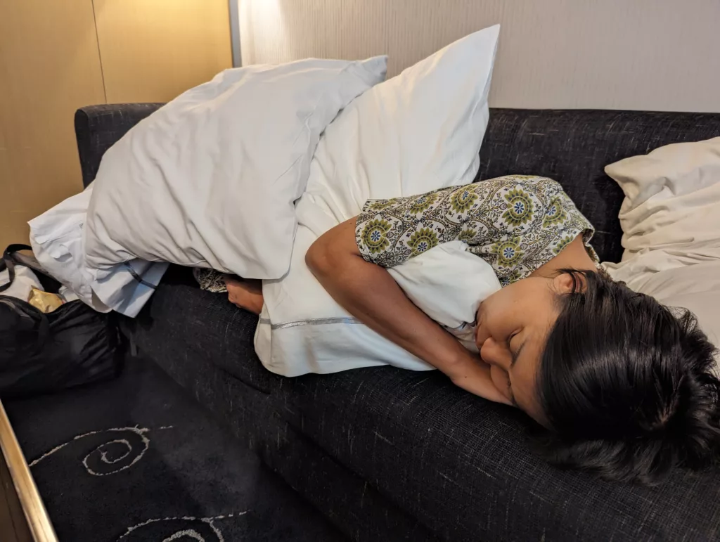 Sachie sleeping on couch