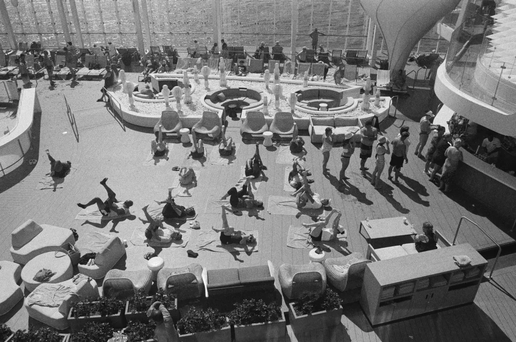 Drinkers queuing and the bar and yoga