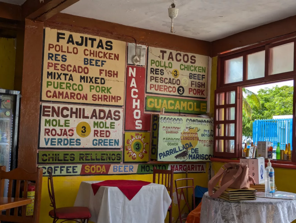 Menu featuring dishes in English and Spanish