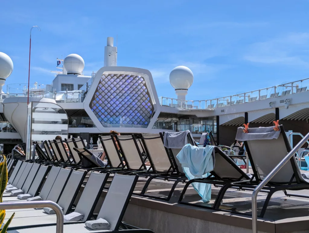 Low angle shot of deckchairs on pool deck.  Hope you appreciate these captions Peter.