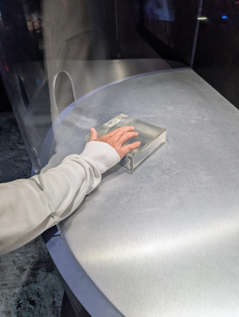 Sachie touching rock