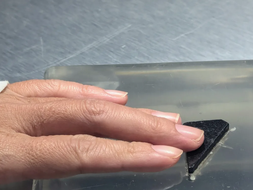 Sachie's fingers on rock